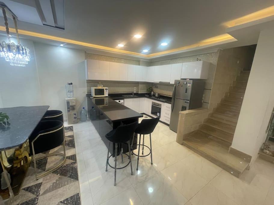 Duplex Apartment At Golden Square Каир Экстерьер фото